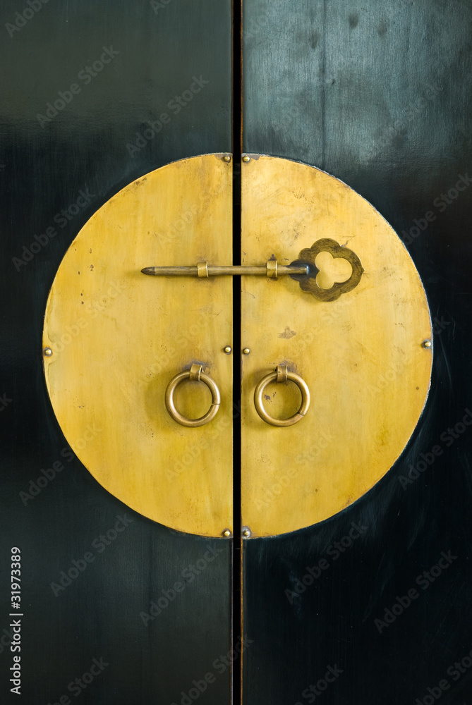 golden key in the cabinet door