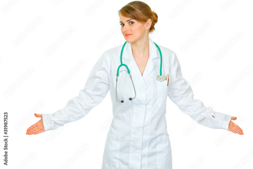 Confused medical doctor woman spreading hands apart Confused medical doctor woman spreading hands apart