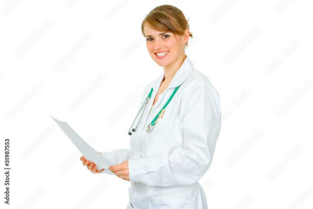 Smiling medical doctor woman holding document in hands Smiling medical doctor woman holding document in hands