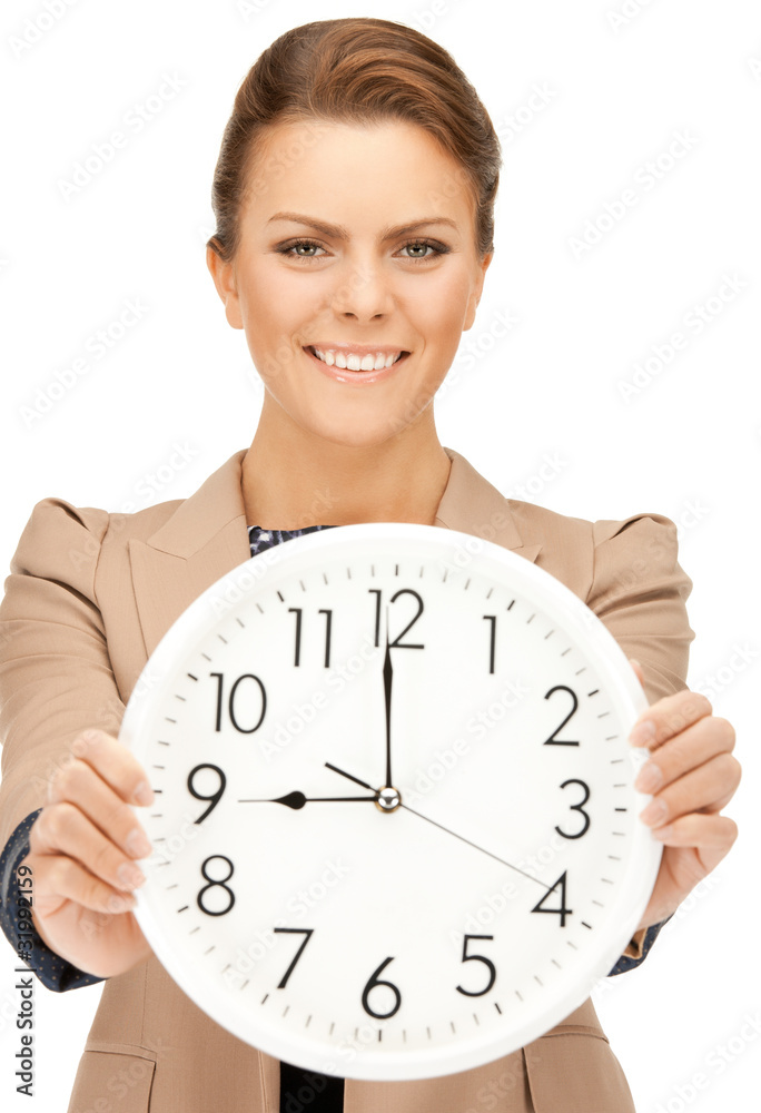 woman holding big clock