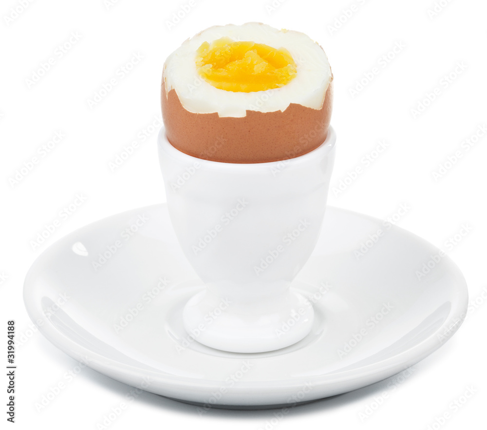 boiled egg in egg cup isolated boiled egg in egg cup isolated