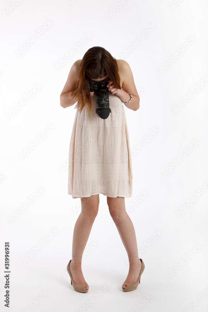 woman with single-lens reflex camera