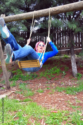 woman on swing at park