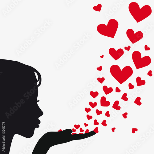 Silhouette woman blowing heart