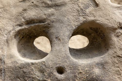Head carved in rock