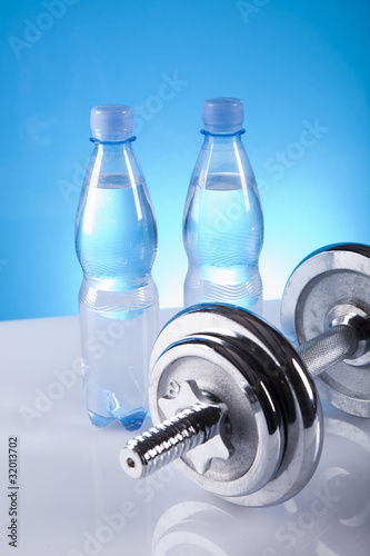 dumbell and mineral water