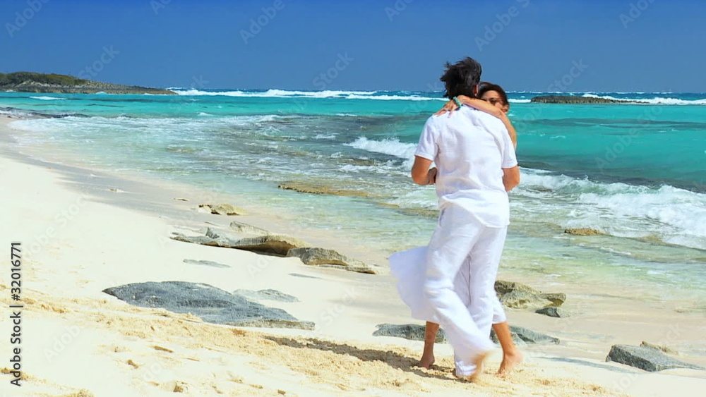 Loving Couple on Dream Destination Paradise Beach Loving Couple on Dream Destination Paradise Beach