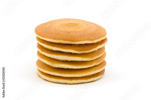 Stack of pancakes over white