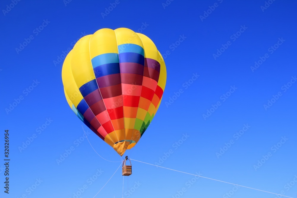Fototapeta premium balloon colorful vivid colors in blue sky