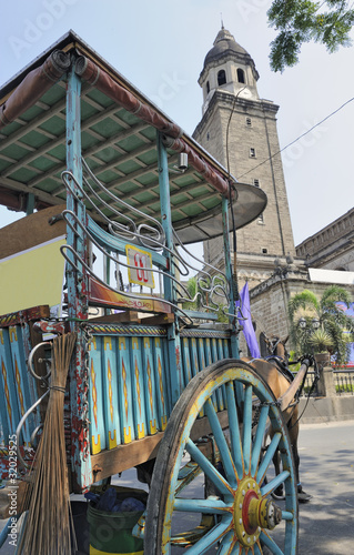 Horse and cart in front of church of San Augustin, Manila