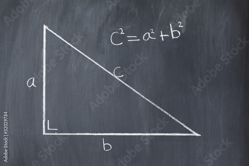 Right triangle with pythagorean formula on a blackboard