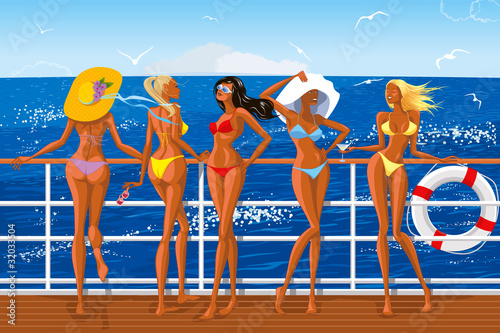 Beautiful girls in bikini sailing on the yacht