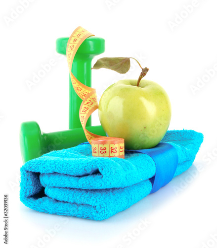 dumbbells, towel, apple and measure tape isolated on white