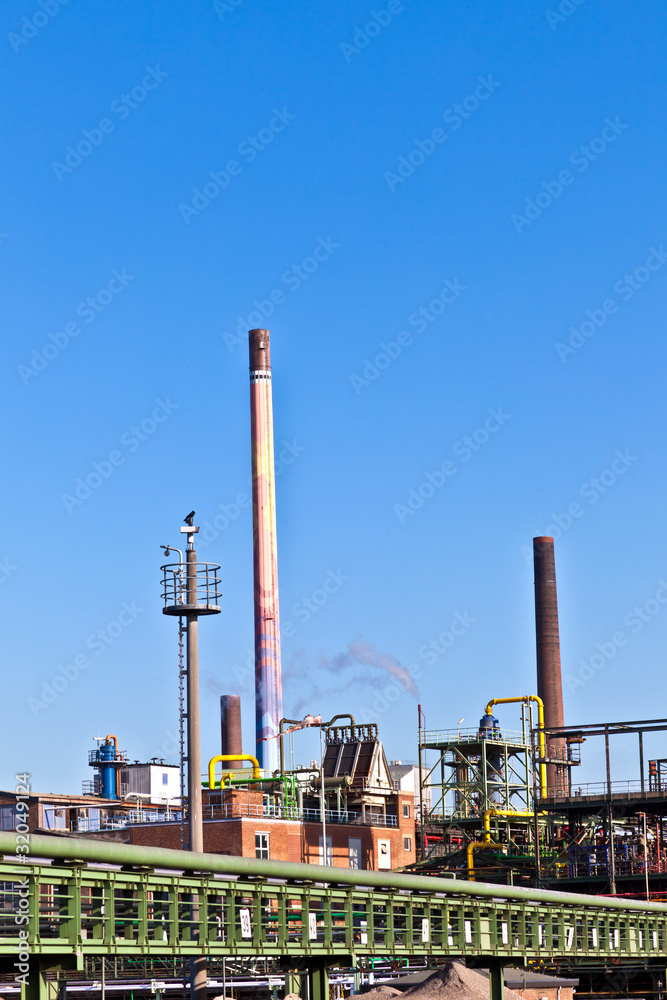 Industry park with silo and chimney