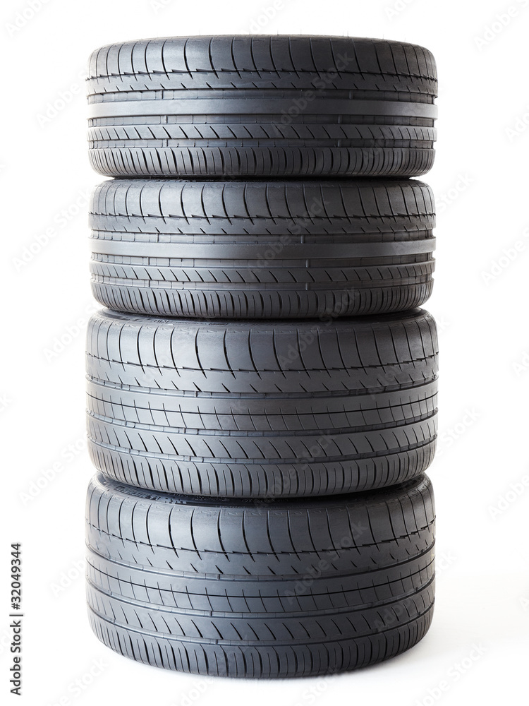 Set of summer tyres isolated on white fond