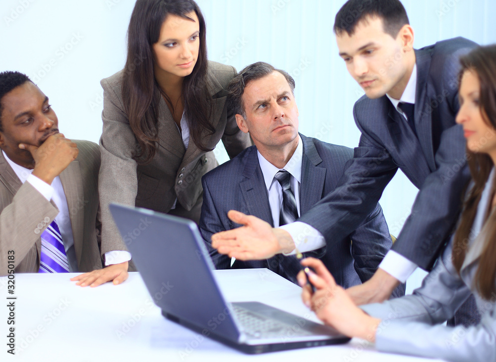 Successful business team working together at office Successful business team working together at office