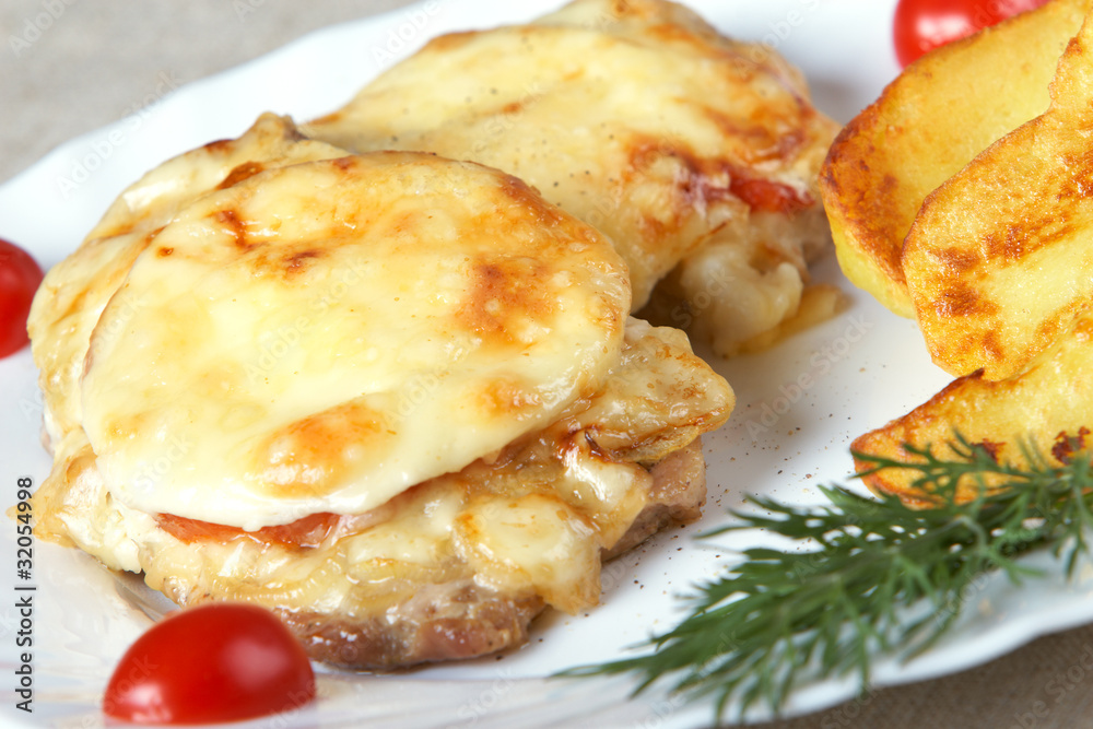 European cuisine. Meat in French with fried potatoes European cuisine. Meat in French with fried potatoes