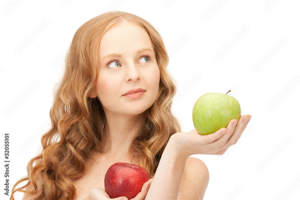 young beautiful woman with green and red apples young beautiful woman with green and red apples