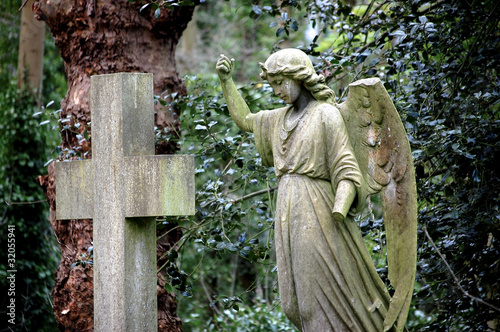 Angel and cross statues in Hampstead Heath, London