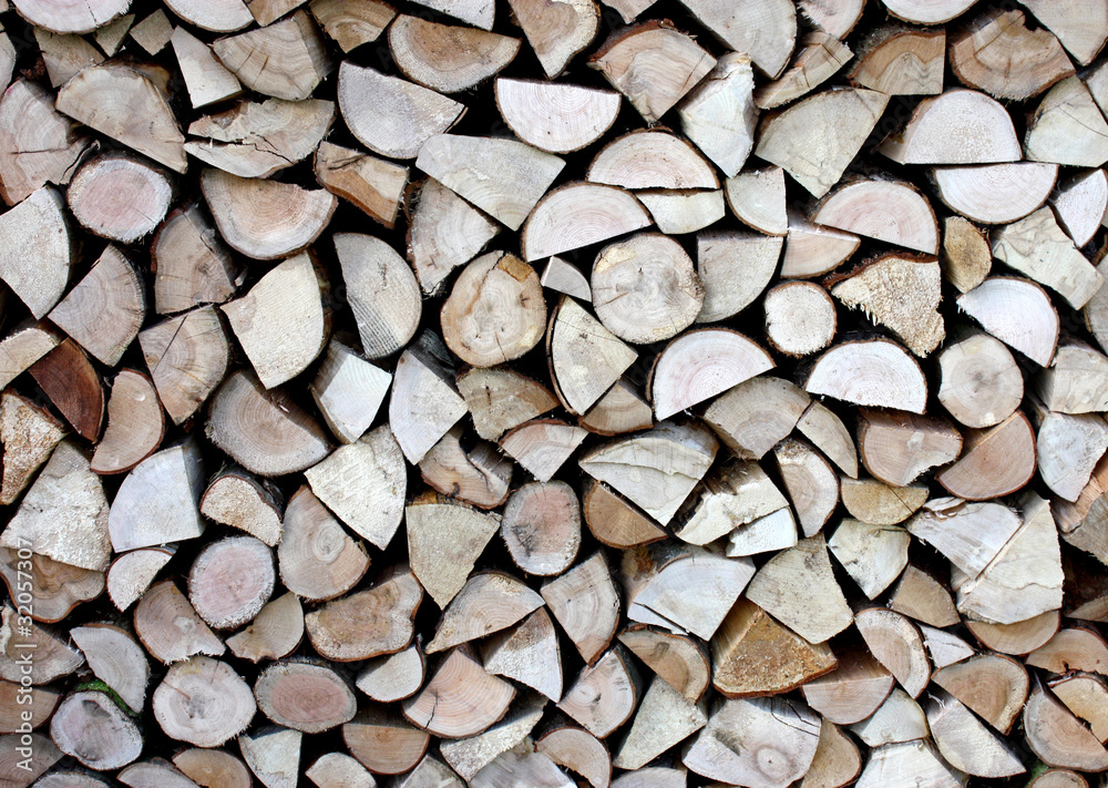 A Neat Pile of Wooden Logs for Firewood. A Neat Pile of Wooden Logs for Firewood.