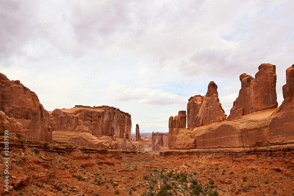 Dramatic sandstone cliffs in Arches National Park, Utah, USA Dramatic sandstone cliffs in Arches National Park, Utah, USA