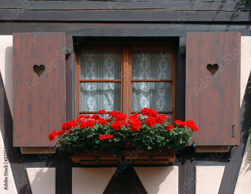 window with hearts and flowers