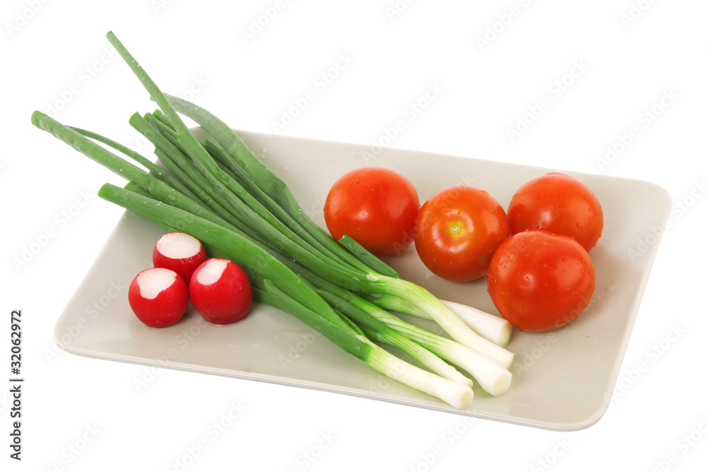 white plate with tomato, radish and green onion white plate with tomato, radish and green onion