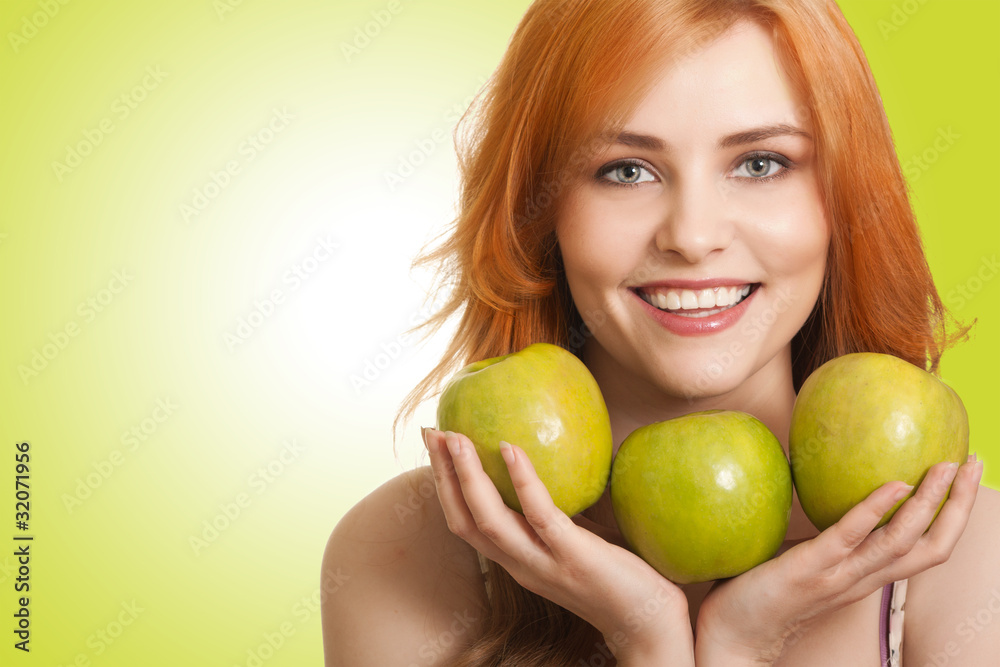 young beauty woman with apple on green background young beauty woman with apple on green background