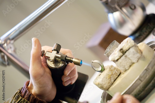 Closeup of  jeweller is working