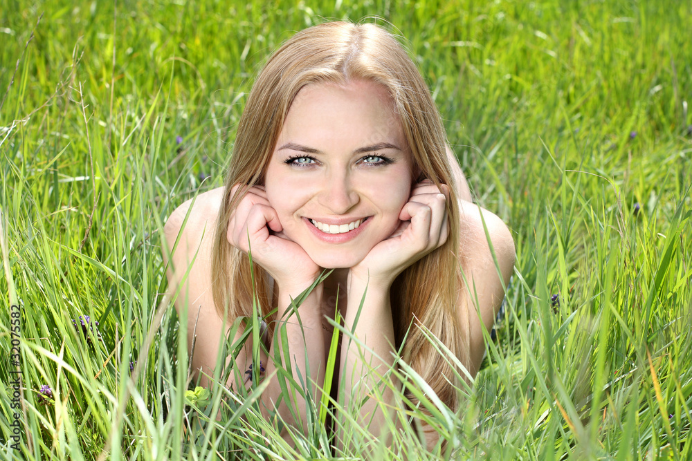 Portrait of an young beautiful woman on the nature Portrait of an young beautiful woman on the nature