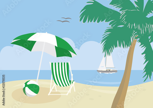 Deck chair, beach ball and umbrella on a tropical beach