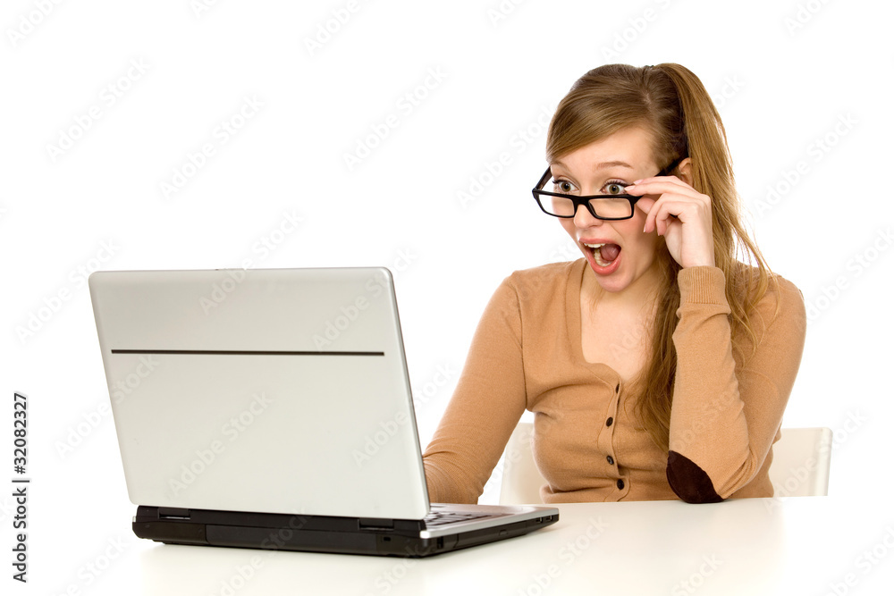 Surprised girl with laptop