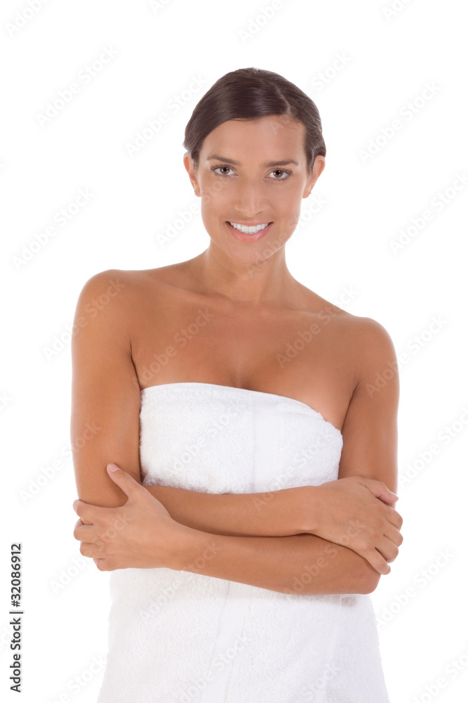 Young Caucasian woman wrapped in bath towel Young Caucasian woman wrapped in bath towel