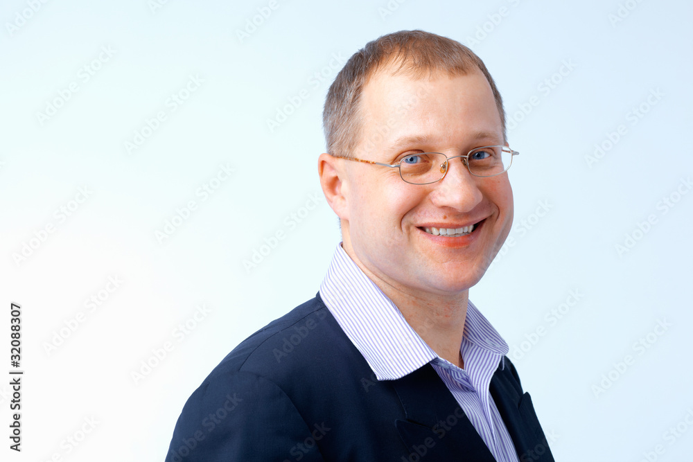 Smiling Man Wearing Glasses.