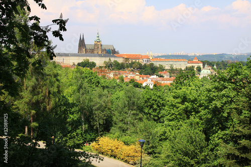 View on the spring Prague gothic Castle with the green Nature