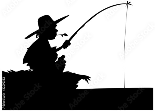 Silhouette of boy fishing
