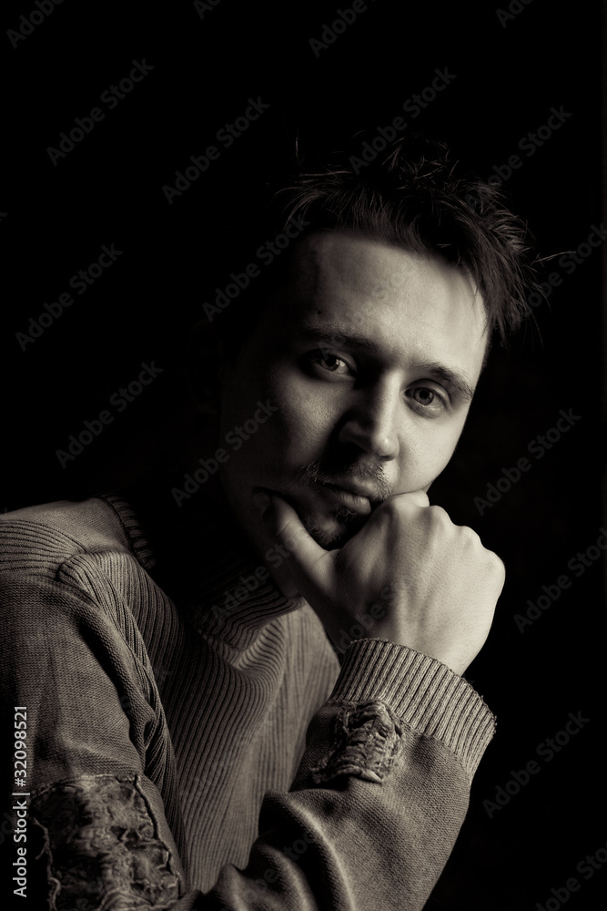 Man in a pensive pose Man in a pensive pose
