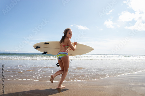 Photography Teenage girl with surfboard