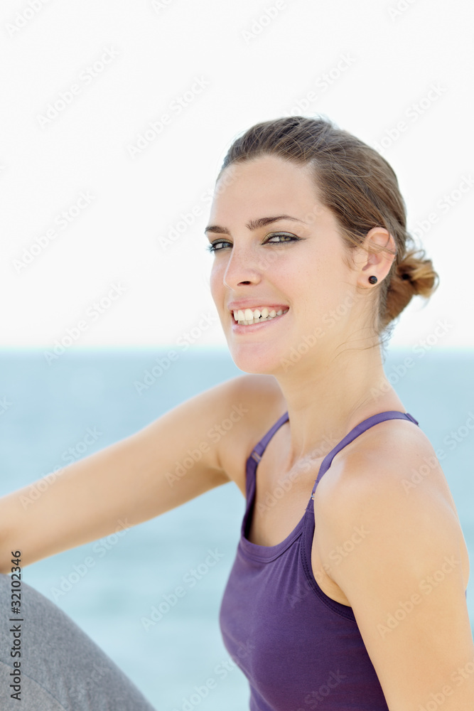 young beautiful woman smiling at camera
