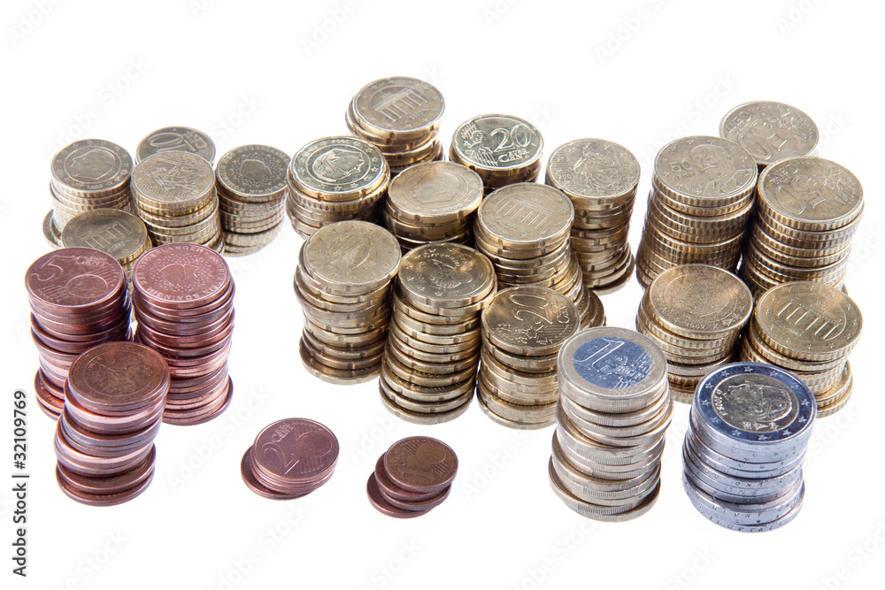 Several piles of european coins on a white background Several piles of european coins on a white background