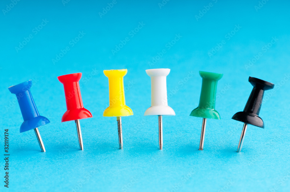 Office pins on the paper Office pins on the paper