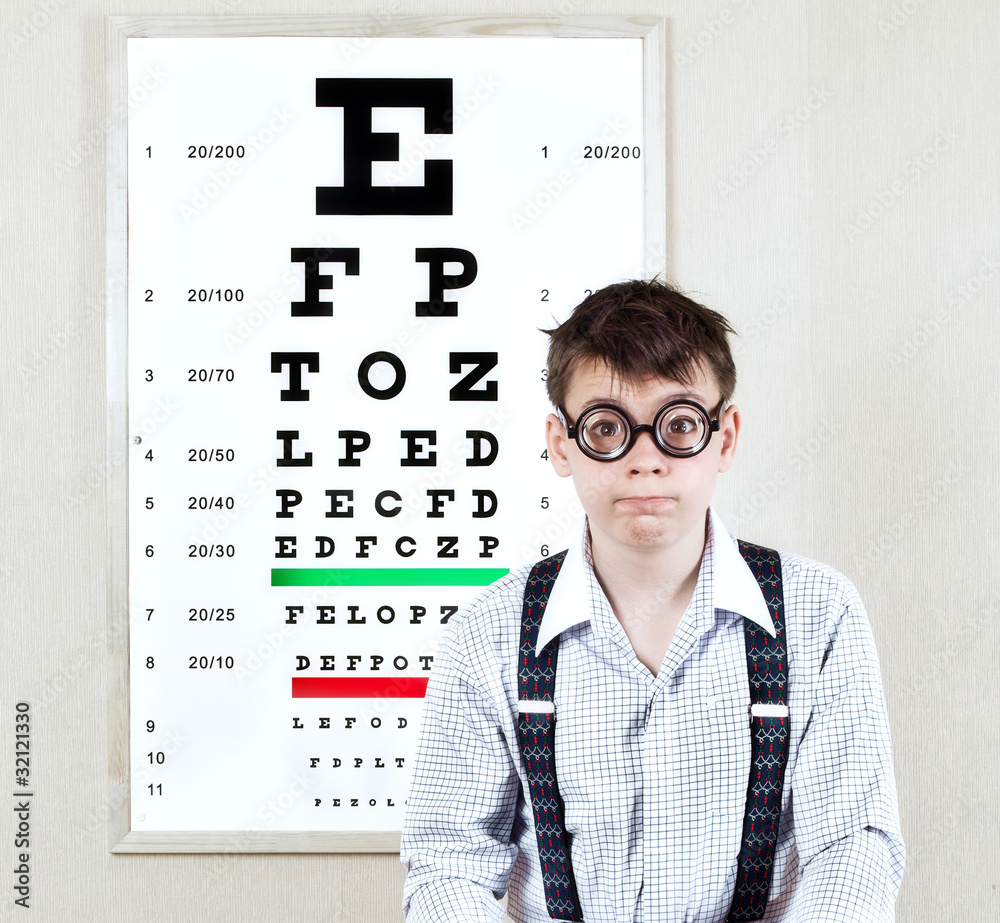 person wearing spectacles in an office at the doctor person wearing spectacles in an office at the doctor