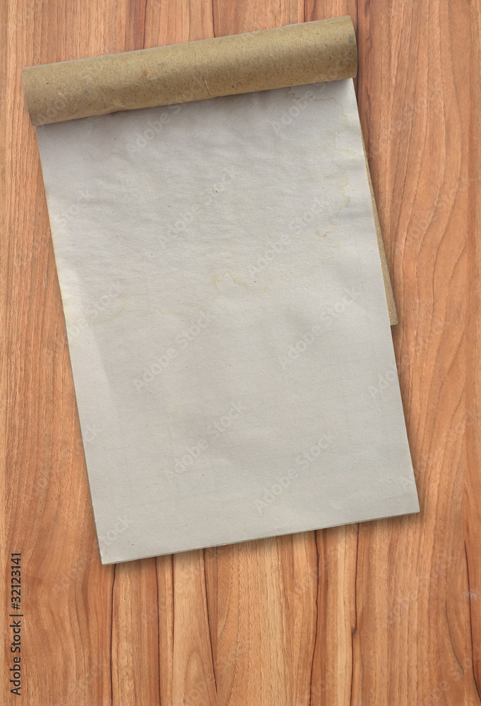 old notebook on a wooden background old notebook on a wooden background