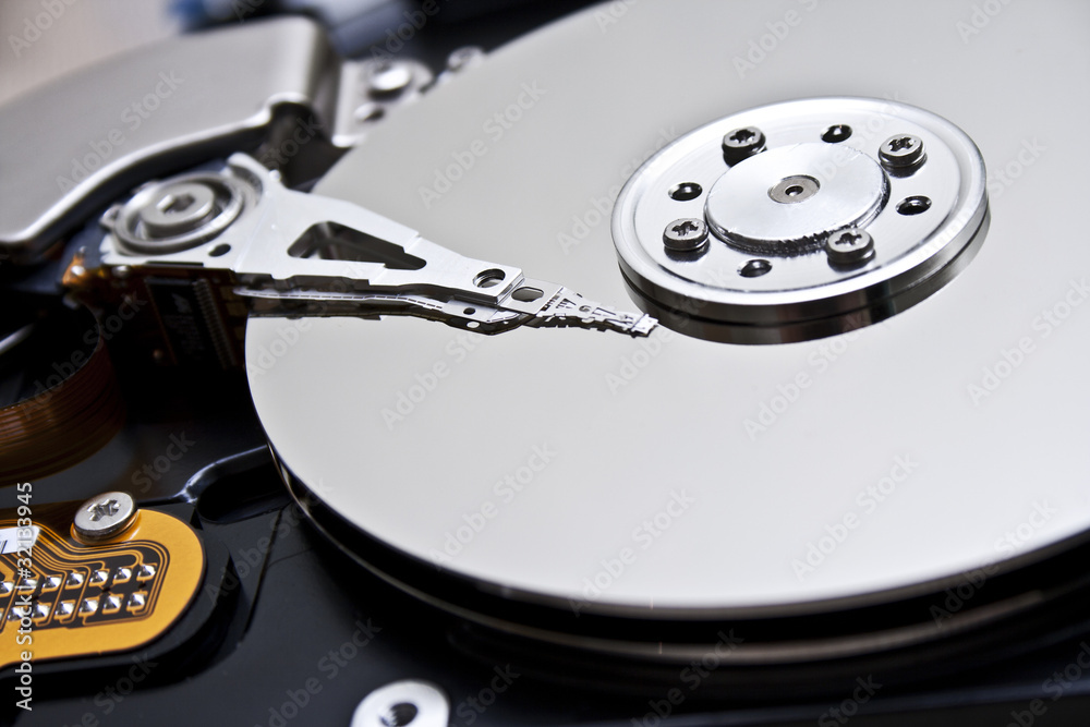 close up of hard disk with abstract reflection close up of hard disk with abstract reflection