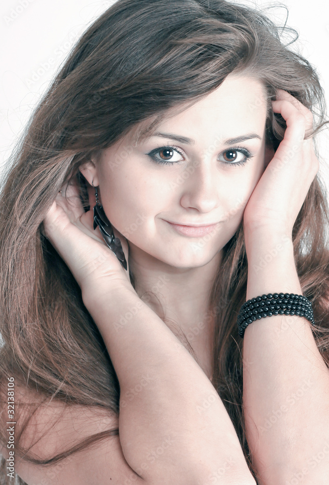 Obraz premium Sensual young woman with beautiful long brown hairs