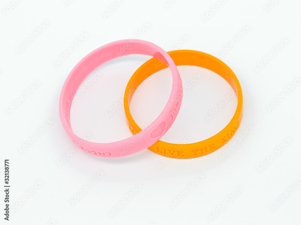Obraz premium Yellow and pink rubber bracelet