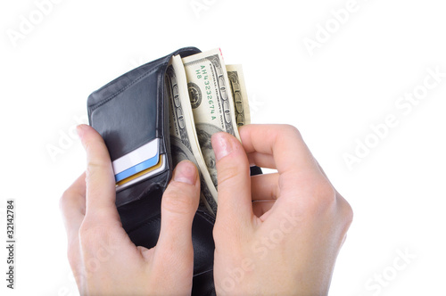 hands taking money from open wallet isolated