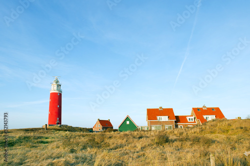 Red lighthouse in the dunes