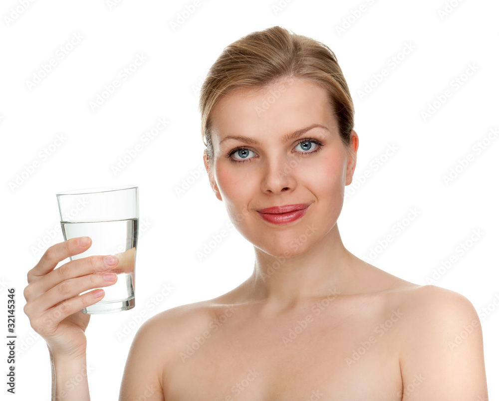 woman holding a glass of fresh water woman holding a glass of fresh water