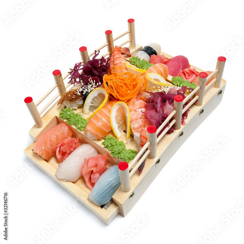 Set of sushi on wooden stand in the form of the bridge
